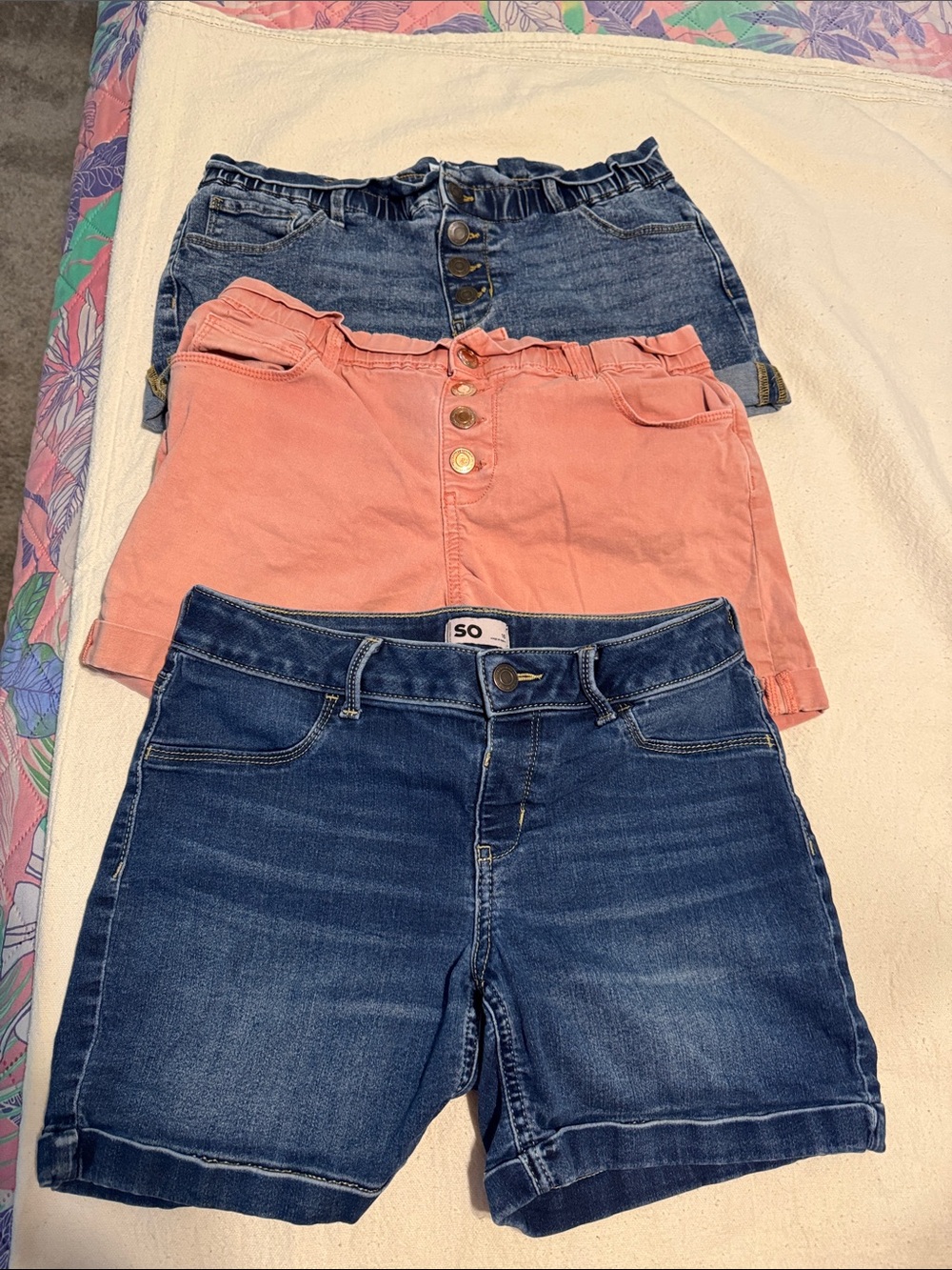 SO Trio: Girls Dark Denim Shorts, Coral Shorts, and Light-Wash Denim Shorts